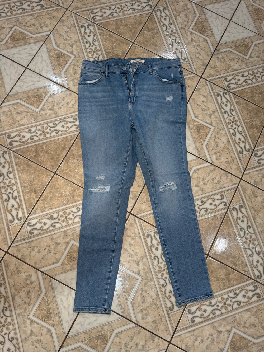 Levi's Medium Blue Skinny Jeans with Light Distressing